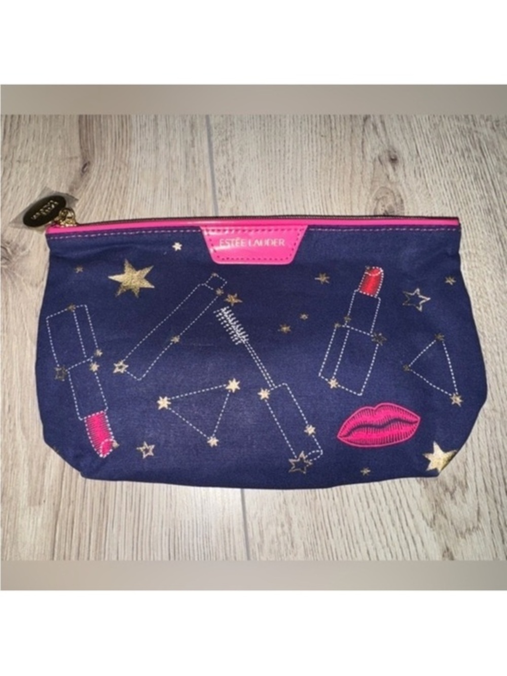 Estee Lauder Navy Cosmetic Pouch with Pink Trim and Gold Stars makeup bag